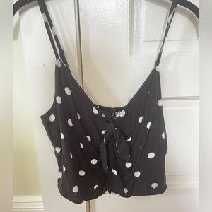 Black and white spotted cropped tie front top